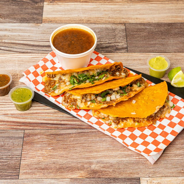 Quesabirria Tacos with Consommé.